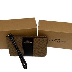Coach Corner Zip Wristlet In Signature Canvas